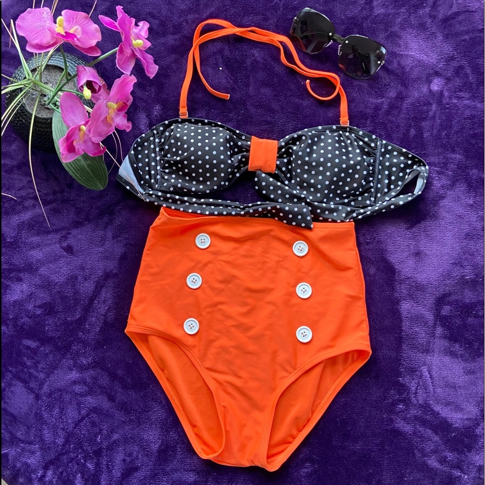 Two piece swim suit. High waist.
